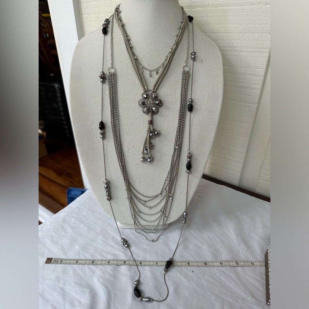 Group of four coordinating silver and gray bead necklaces